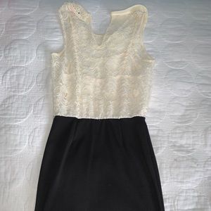 Black and white dress with pearls on collar